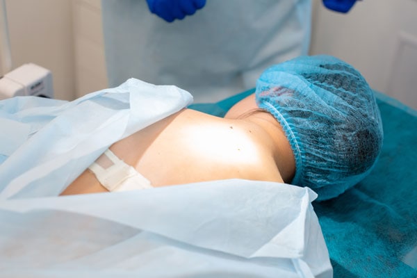 patient being prepped for spinal surgery